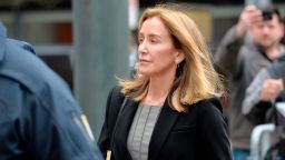 Actress Felicity Huffman is escorted by Police into court where she is expected to plead guilty to one count of conspiracy to commit mail fraud and honest services mail fraud before Judge Talwani at John Joseph Moakley United States Courthouse in Boston, Massachusetts, May 13, 2019. (Photo by Joseph Prezioso / AFP)        (Photo credit should read JOSEPH PREZIOSO/AFP/Getty Images)