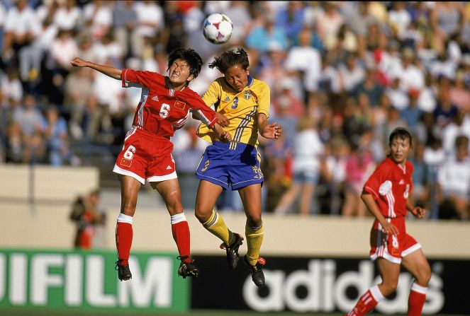 Lihong Zhao (6) of China and Sweden's Jane Tornqvist (3) battle for the ball in a tussle between the top two teams in Group D. China, the eventual finalists, would go on to win the match 2-1. 