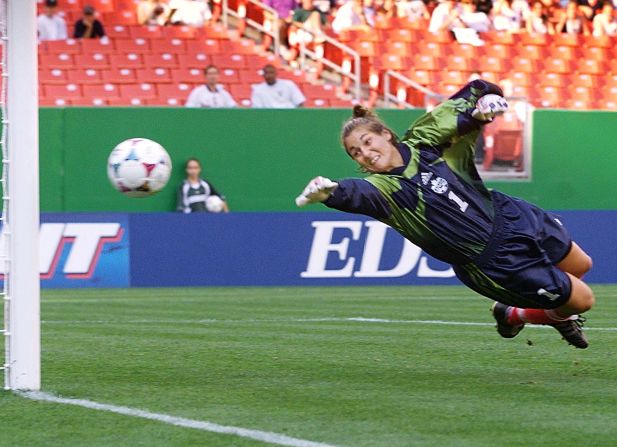Canada's goalkeeper Nicci Wright at full stretch against Norway in Maryland, a group match Norway would win 7-1.