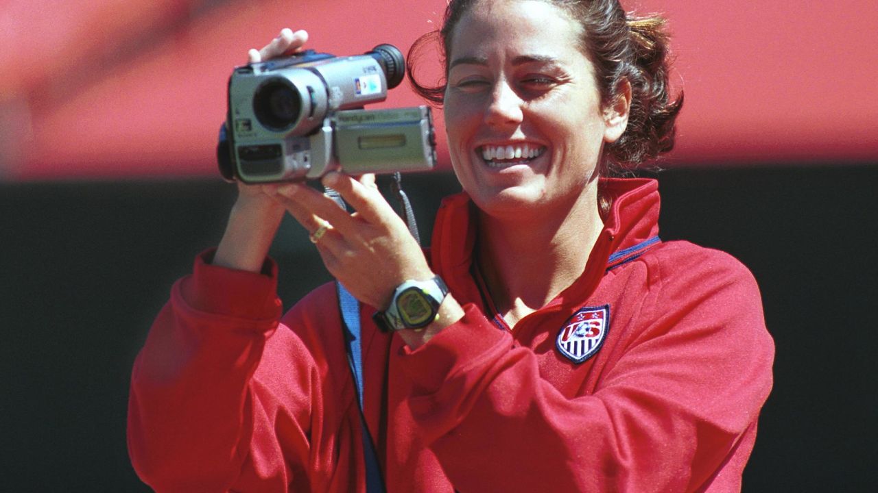 Foudy films her teammates at Stanford Stadium. 