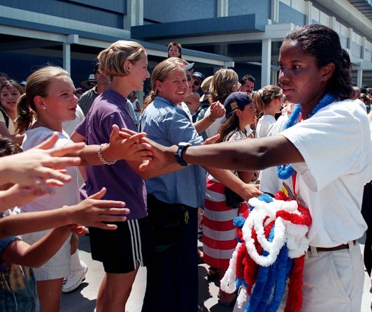 U.S. goalkeeper Briana Scurry thanks supporters who gathered at a fan rally on July 11 at the convention center in Los Angeles, California. 