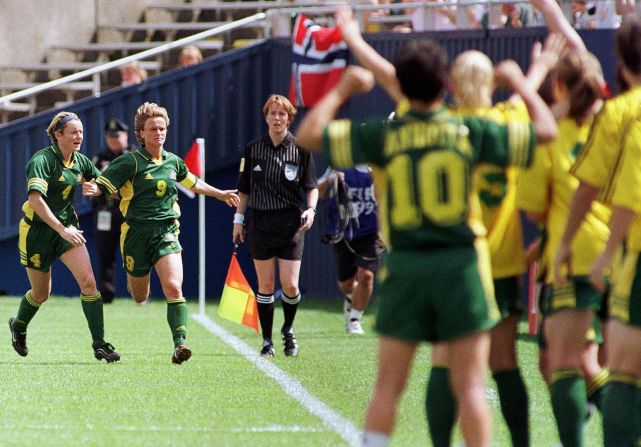 Australia's Julie Murray rushes her bench after scoring in the second half against Ghana. Australia drew 1-1 and finished third in Group D.