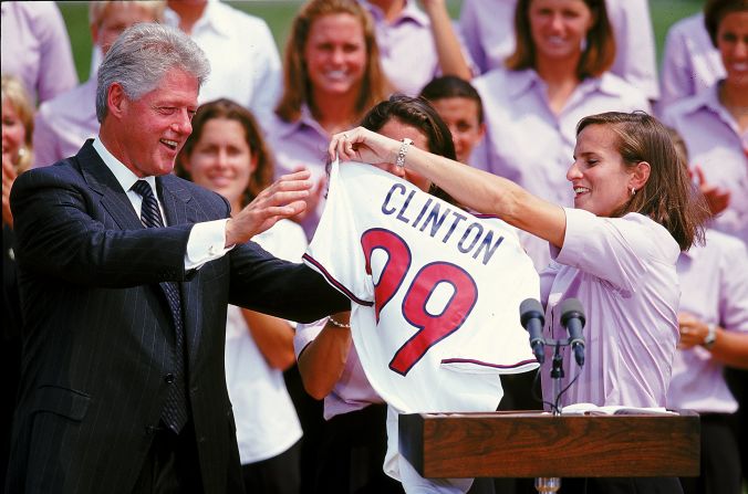 The World Cup winners were welcomed to the White House. Brandi Chastain gives President Clinton a team jersey at the White House in Washington, D.C. 