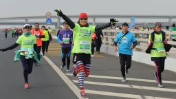 Runners compete in the Qingdao international sea marathon held on Jiaozhou Bay Bridge on 19th November 2017 in Qingdao, Shandong, China.