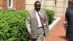 Yusuf Abdi Ali, an accused war criminal, leaves the federal courthouse in Alexandria, Virginia.