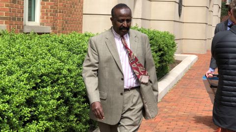 Yusuf Abdi Ali, an accused war criminal, leaves the federal courthouse in Alexandria, Virginia.