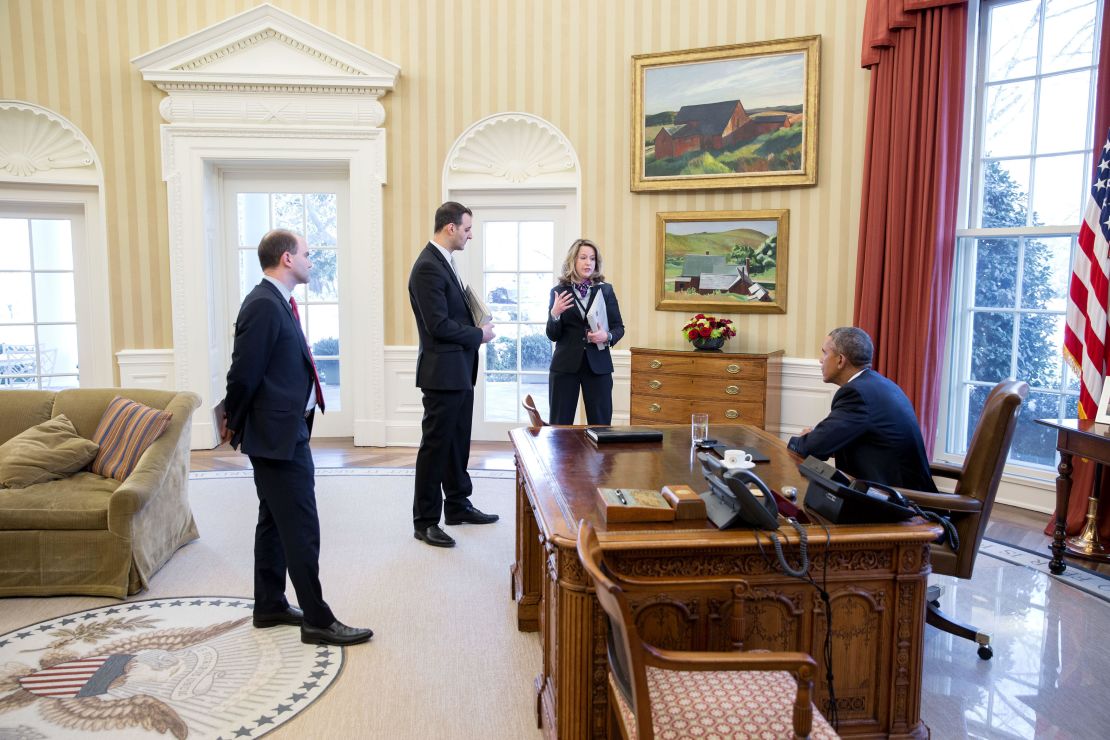 President Obama is briefed by George Selim, second from left, ahead of a White House Summit on Countering Violent Extremism. 