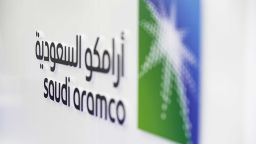 A Saudi Aramco logo sits on display during the Abu Dhabi International Petroleum Exhibition & Conference (ADIPEC) in Abu Dhabi, United Arab Emirates, on Tuesday, Nov. 13, 2018. OPECs secretary-general, energy ministers from Saudi Arabia to Russia, CEOs at oil majors from Total SA, BP Plc and Eni SpA, and officials from Middle Eastern energy giants such as Abu Dhabis Adnoc have gathered to sign deals and discuss oil, gas, refining and petrochemical issues. Photographer: Christopher Pike/Bloomberg via Getty Images