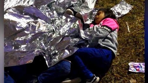 migrant children sleeping on ground at border patrol station 01
