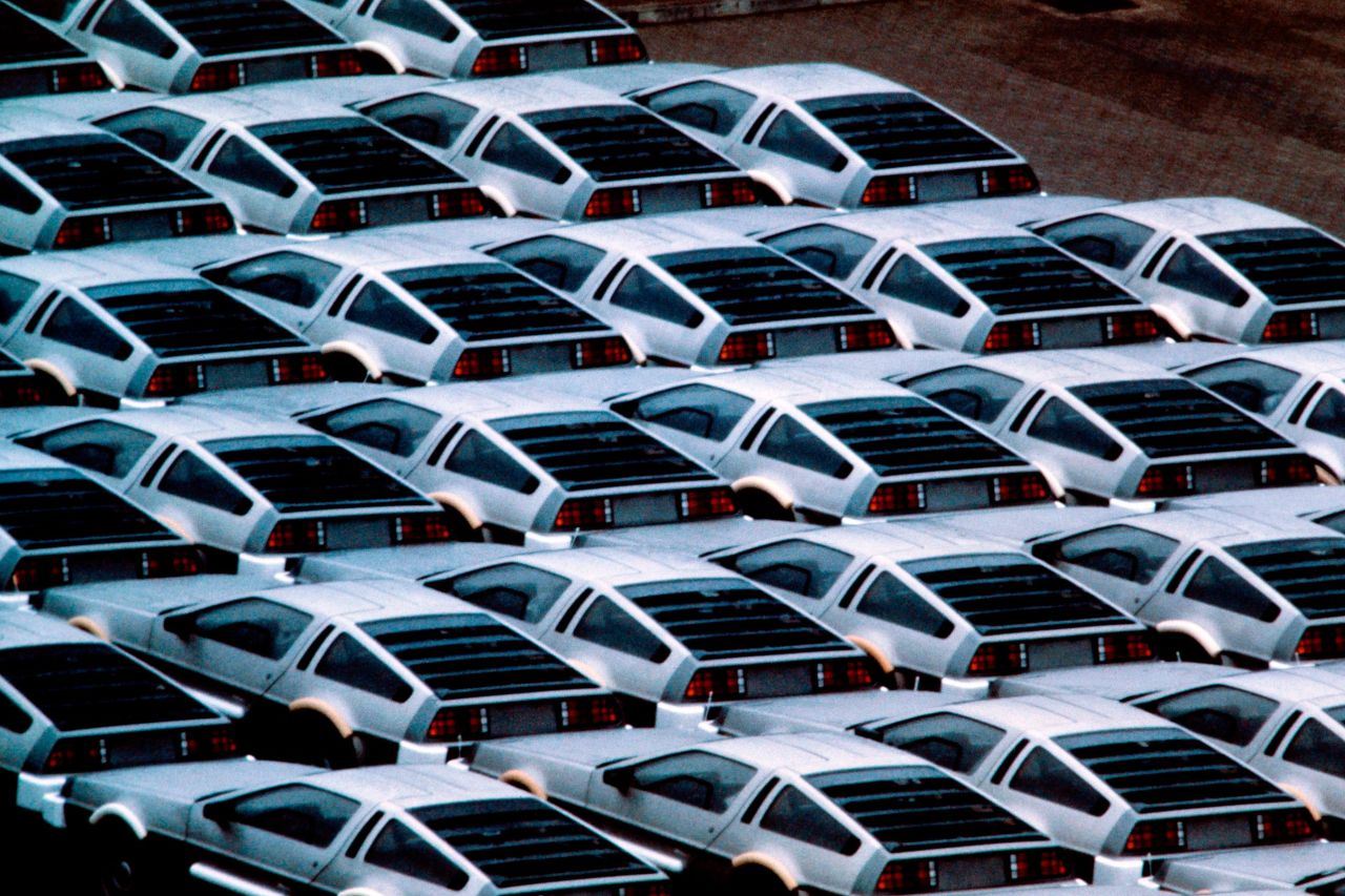 Deloreans stockpiled at DMC's plant before being exported to the USA.
