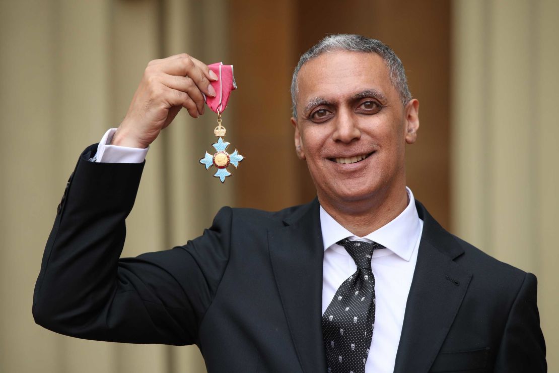 Nitin Sawhney holds his CBE for services to music at Buckingham Palace on May 9, 2019 in London, England.