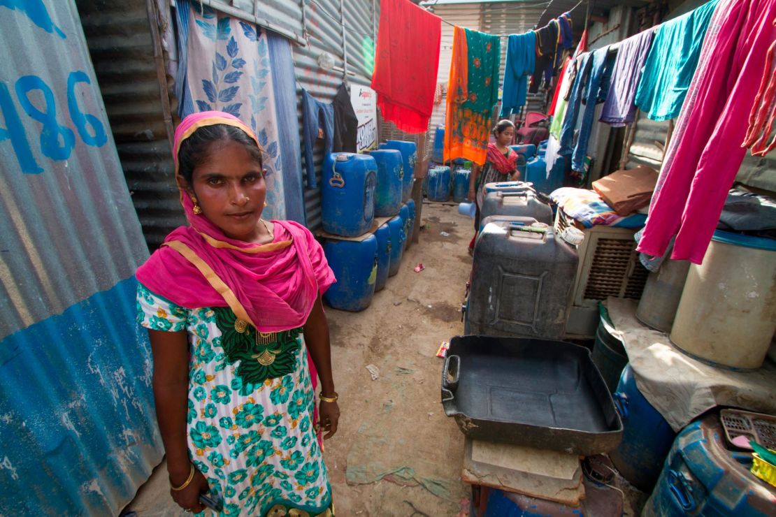 Fatima Bibi is in charge of water distribution for the Vasant Kunj slum.