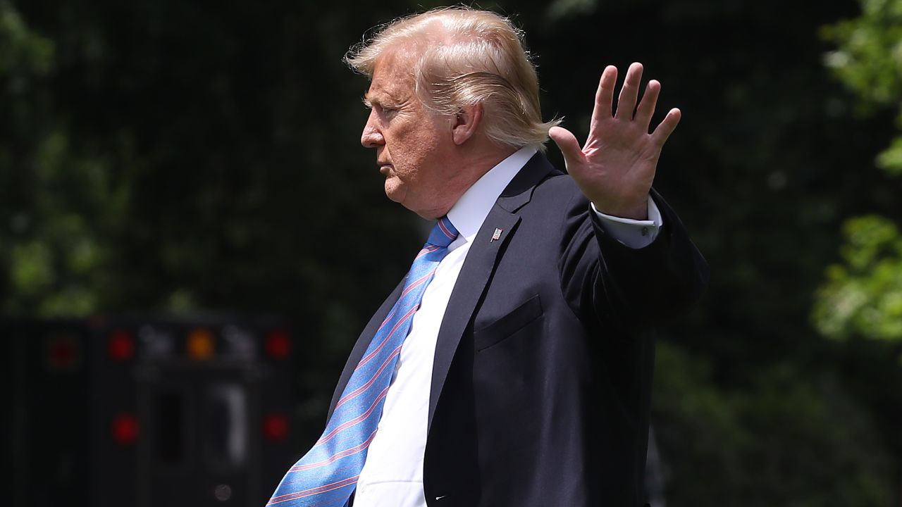 US President Donald Trump waves as he walks toward Marine One before departing from the White House in this May file photograph.