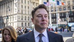 Elon Musk, chief executive officer of Tesla Inc., arrives at federal court in New York, U.S., on Thursday, April 4, 2019. The SEC says Musk violated his agreement with the agency when he tweeted on February 19 that Tesla would make about half a million cars in 2019, before tweeting a few hours later that deliveries would only reach about 400,000. Photographer: Natan Dvir/Bloomberg via Getty Images