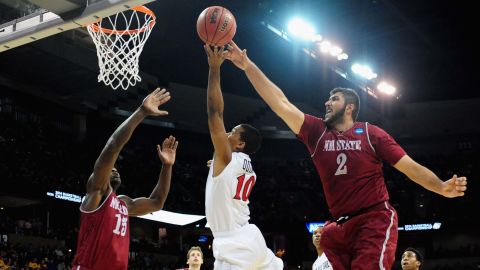 Sim Bhullar plays for the New Mexico State Aggies against the San Diego State Aztecs in the NCAA Men's Basketball Tournament on March 20, 2014 in Spokane, Washington. 