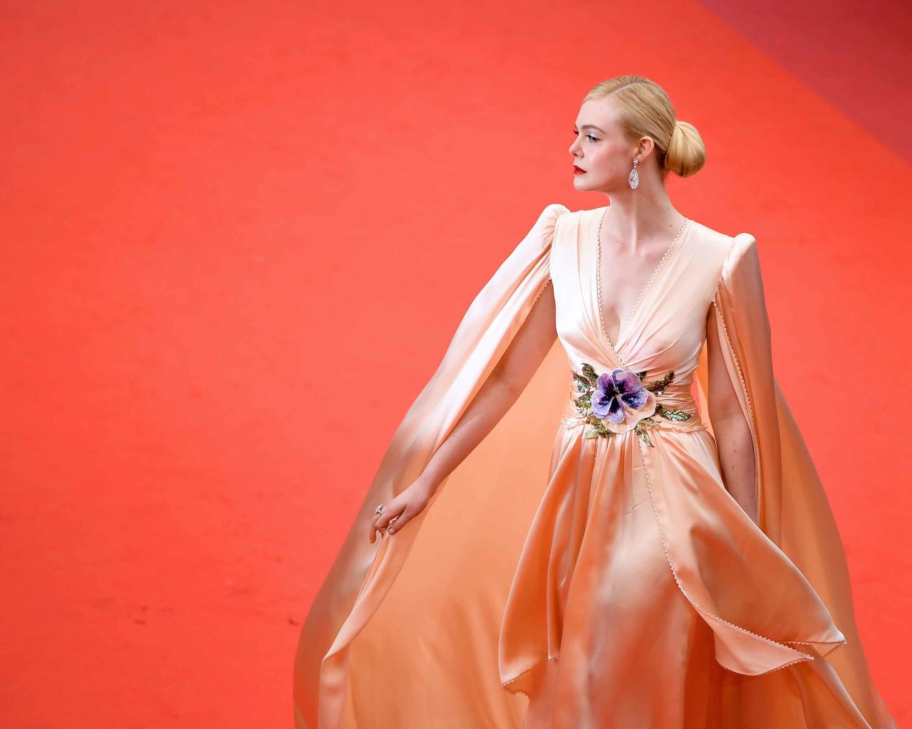 Twenty-one-year-old Elle Fanning -- who is now the youngest ever Cannes jury member -- looks triumphant in Gucci.