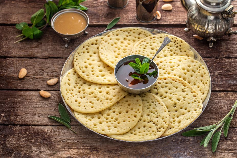 <strong>Morocco:</strong> Baghrir are thin, yeasted rounds studded with tiny holes and served with butter and honey.