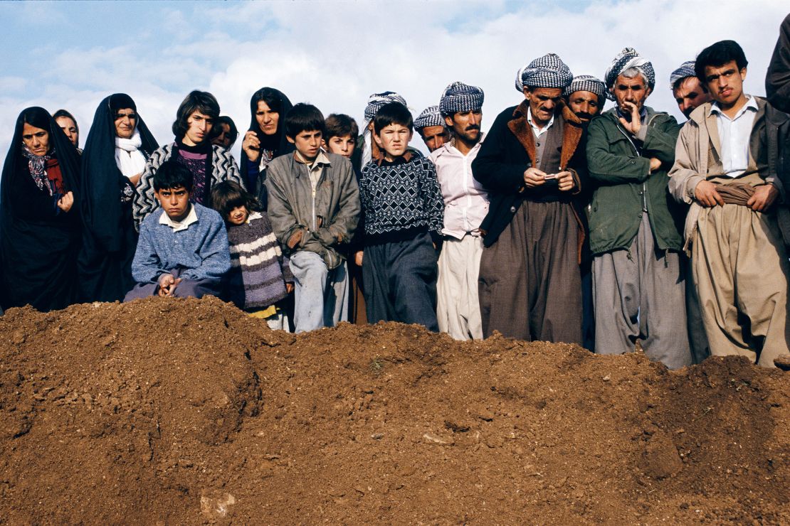 Northern Iraq, 1991. Trench graves are excavated to reveal the bodies of executed Iranian prisoners of war. 