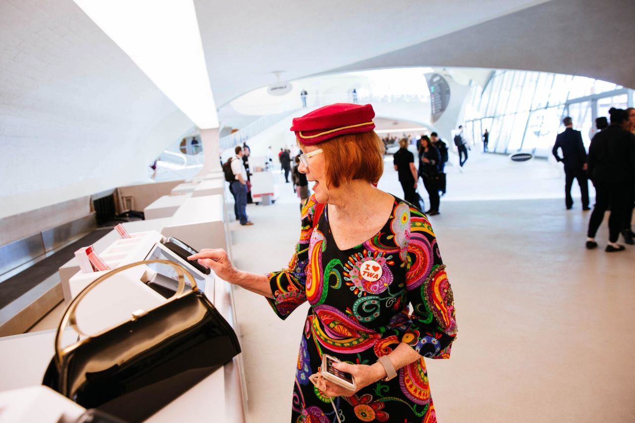 <strong>Check in: </strong>Guest Billie O'Hagan, a flight attendant at Alaska Airlines, checks in at the front desk in the new TWA Hotel.