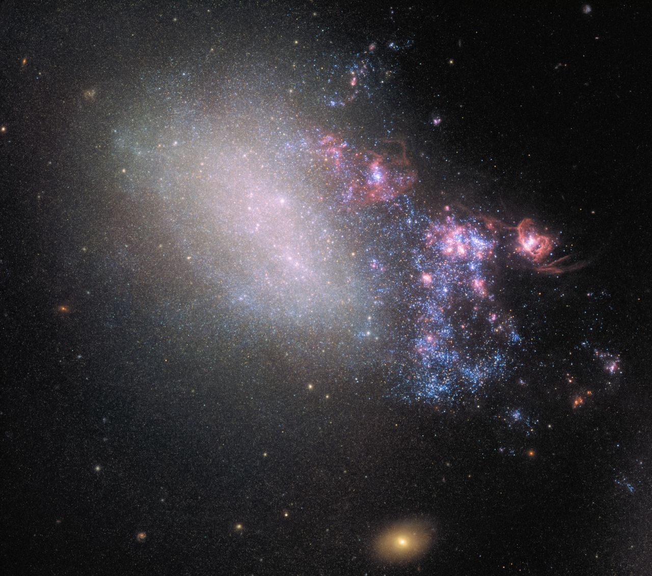 Galaxy NGC 4485 collided with its larger galactic neighbor NGC 4490 millions of years ago, leading to the creation of new stars seen in the right side of the image.