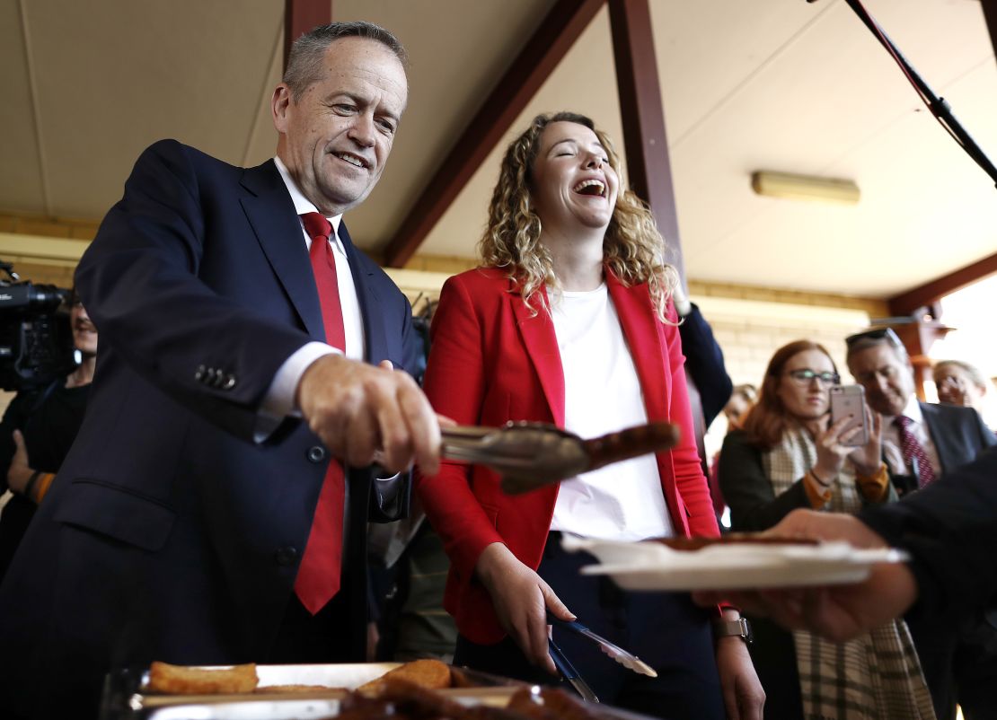 Labor Leader Bill Shorten and Labor Candidate for Boothby Nadia Clancy hand out sausages in Adelaide on May 14.