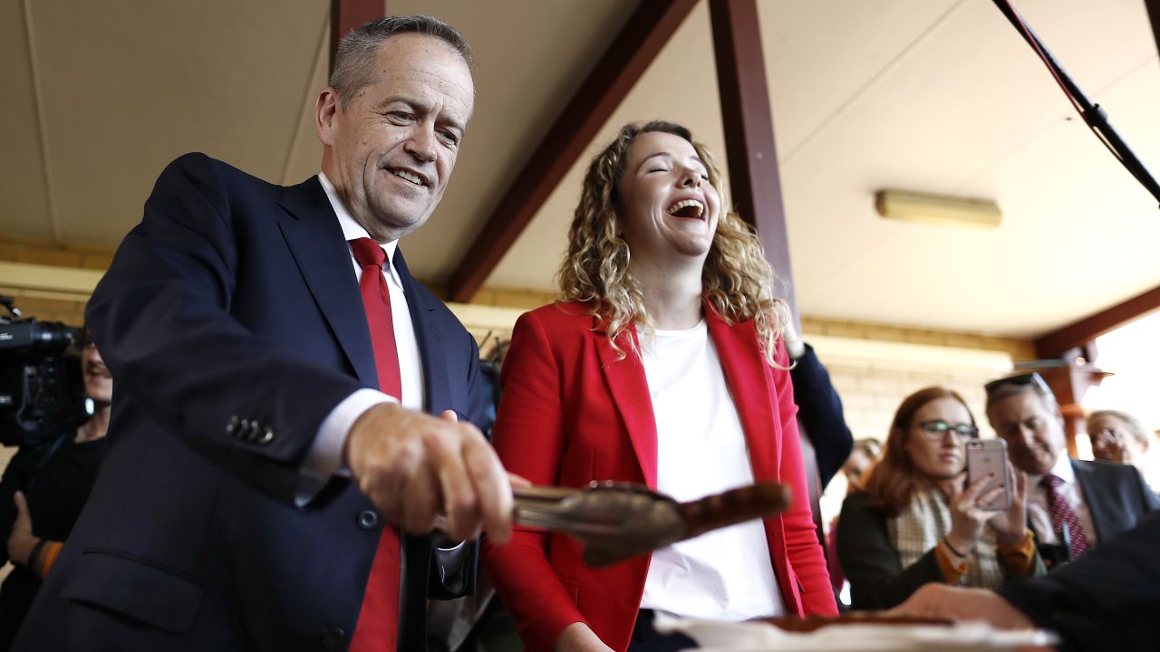 Labor leader Bill Shorten and Labor candidate for Boothby Nadia Clancy hand out sausages to supporters during a community BBQ on May 14.