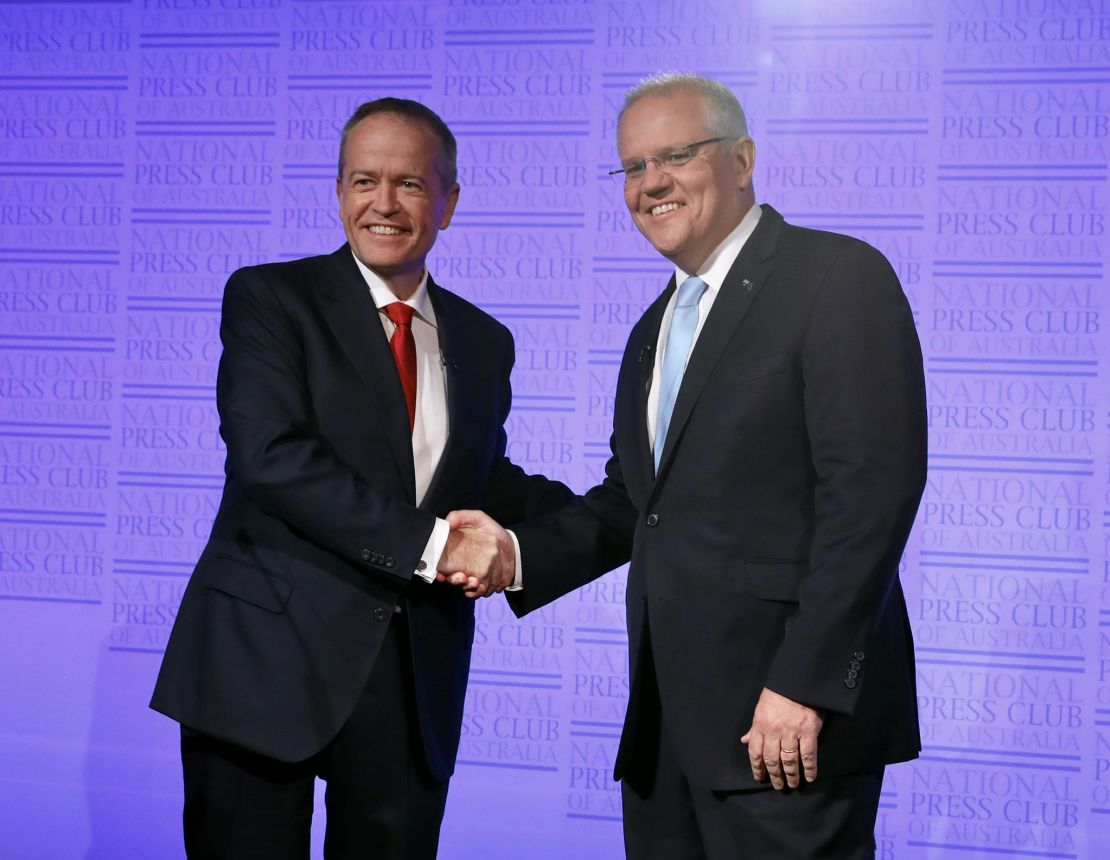 Prime Minister Scott Morrison and Labor leader Bill Shorten shake hands at the start of "The Leaders' Debate'' on May 8 in Canberra.