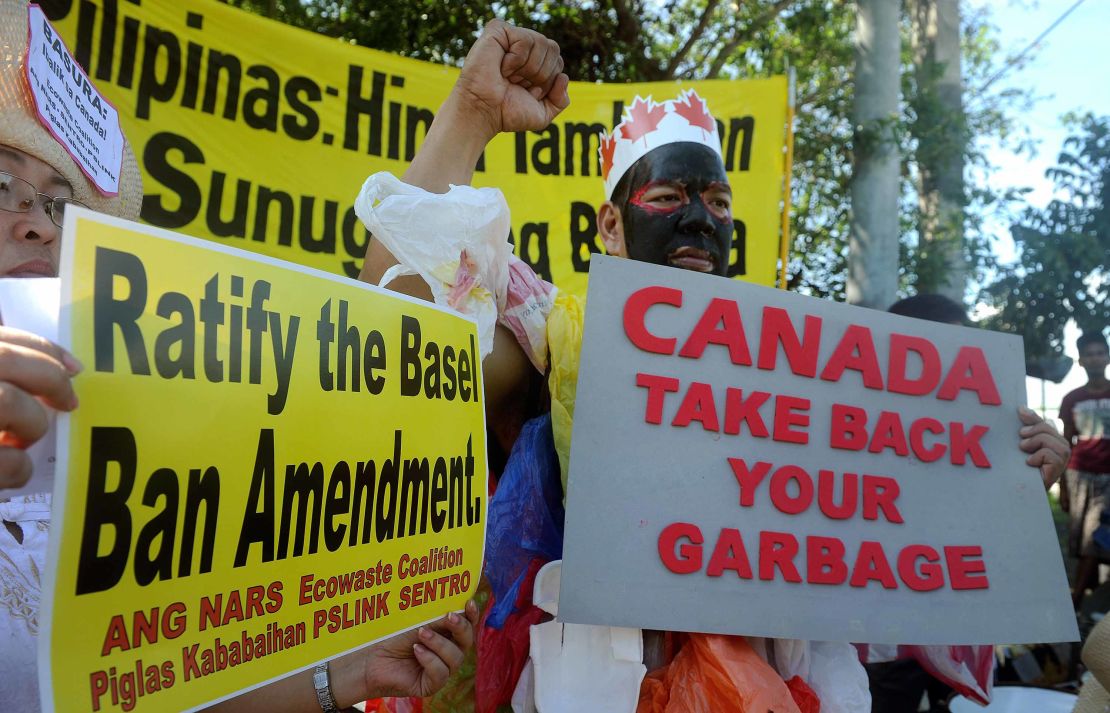 Environmental activists in Manila on September 9, 2015, demanding trash be shipped back to Canada.