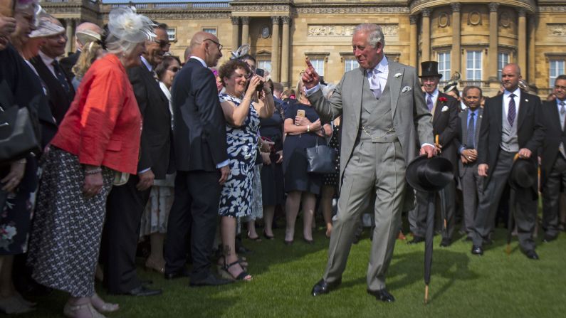 Britain's Prince Charles greets guests at the Queen's Garden Party at Buckingham Palace on Wednesday, May 15.