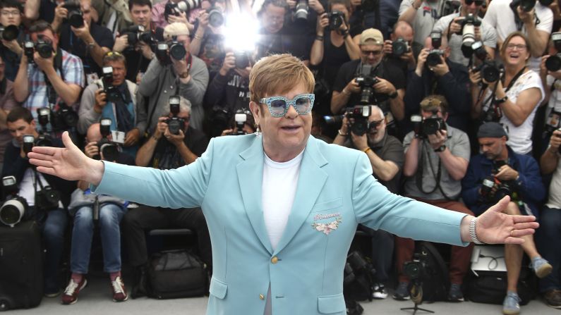 Singer Elton John poses for photographers at the Cannes Film Festival on Thursday, May 16. The festival was screening the John biopic "Rocketman," starring Taron Egerton.