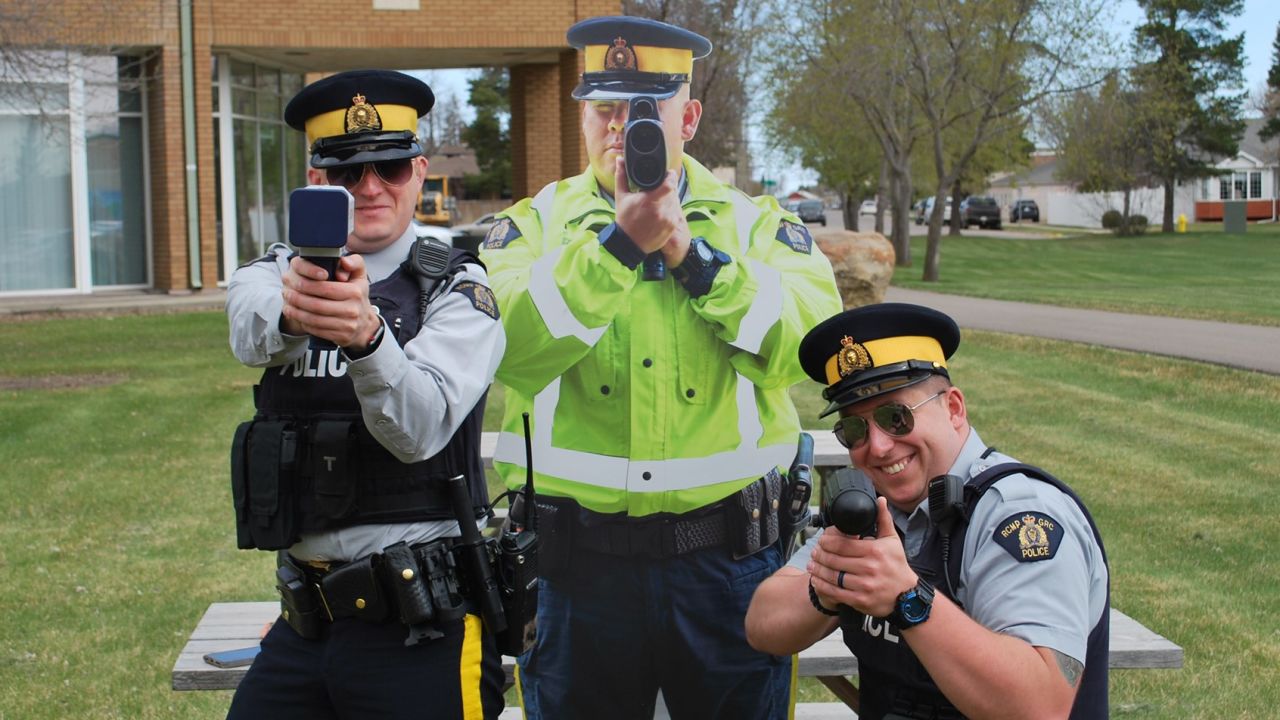 Hot fuzz: Constable Michael Hagel and a fellow officer pose with a cutout modeled after Hagel.