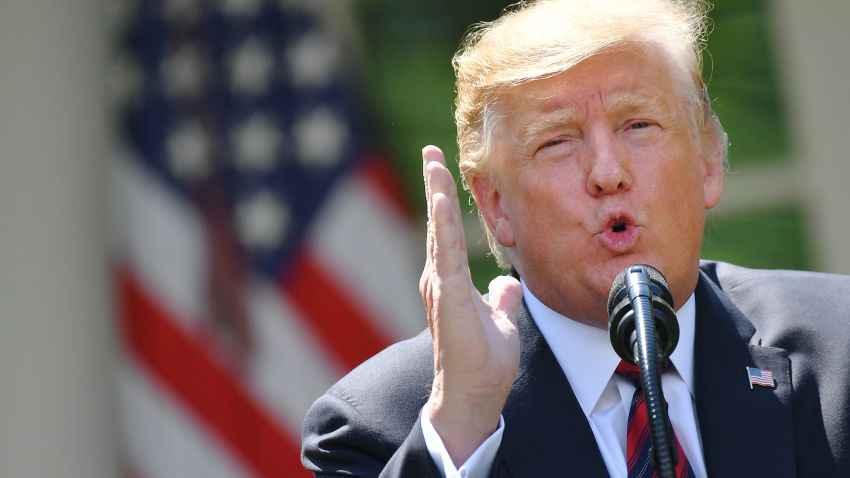 US President Donald Trump gestures as he delivers remarks on immigration at the Rose Garden of the White House in Washington, DC on May 16, 2019. - President Donald Trump called for radical immigration reform to favor skilled, English-speaking workers over the poorly educated and to shut the door on "frivolous" asylum claimants. (Photo by MANDEL NGAN / AFP)        (Photo credit should read MANDEL NGAN/AFP/Getty Images)
