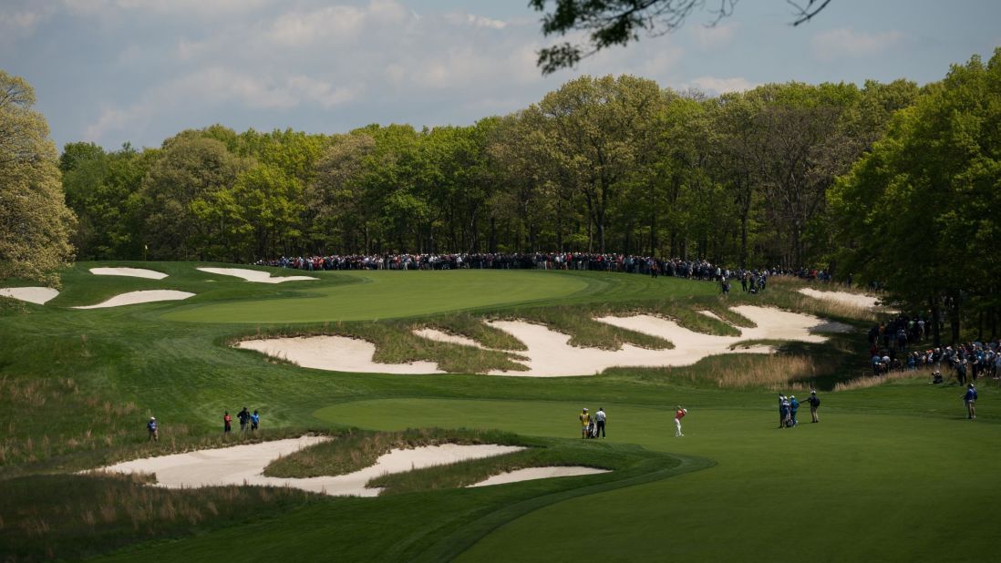 Alex Noren takes stock on the third hole of this thrillingly difficult golf course. If you miss the fairway and the bunkers, the long grass will eat you alive.