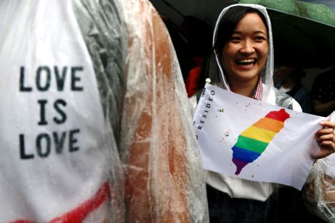 Supporters of same-sex marriage gather outside as parliamentarians debated in Taipei, Taiwan, on Friday.