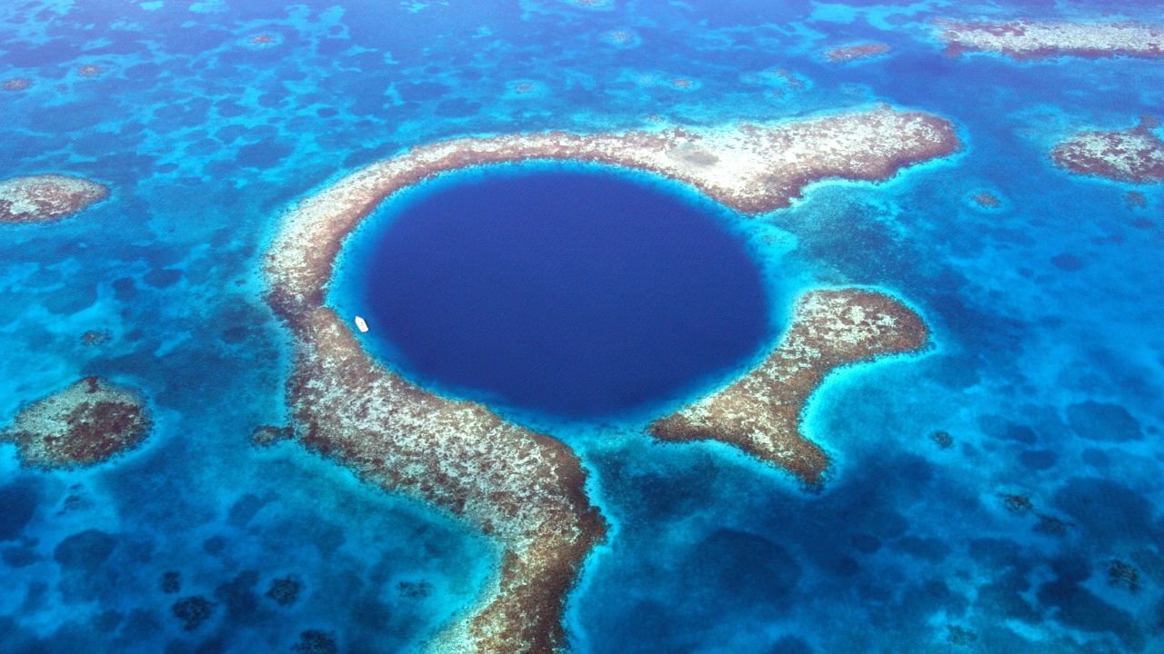This huge underwater sinkhole is positioned off the coast of Belize.