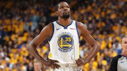 Kevin Durant #35 of the Golden State Warriors looks on against the Houston Rockets during Game Five of the Western Conference Semifinals of the 2019 NBA Playoffs on May 8, 2019 at ORACLE Arena in Oakland, California. 