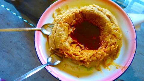 Genfo is a thick porridge made with barley, wheat and corn flour, and it's a traditional porridge.
