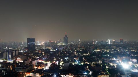 Smoke and pollution hangs over in Mexico City, early Thursday, May 16, 2019.