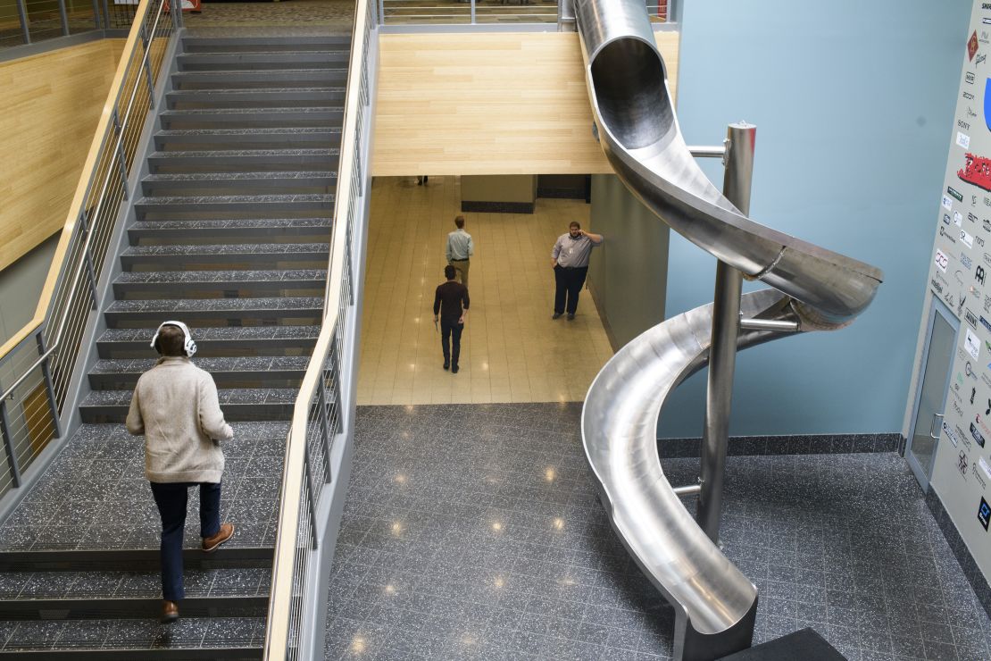Sweetwater Sound's campus features a metal slide connecting the first and second floors.