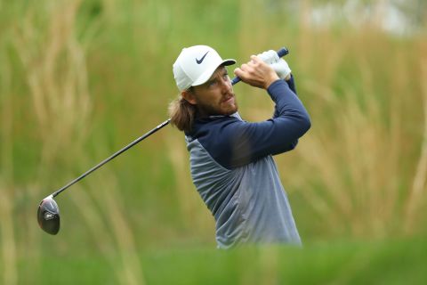 Tommy Fleetwood plays a shot from the fourth tee.