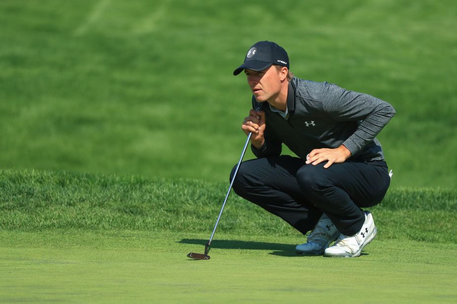 Jordan Spieth of the United States lines up a putt on the 16th green during the second round of the US PGA Championship. At the end of the round, Spieth was tied second with Australian Adam Scott.