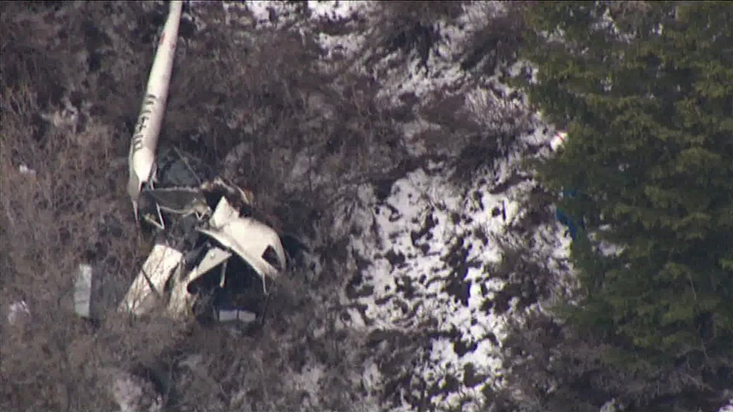 Aerial footage shows the helicopter crash site Friday  near Alpine, Utah.