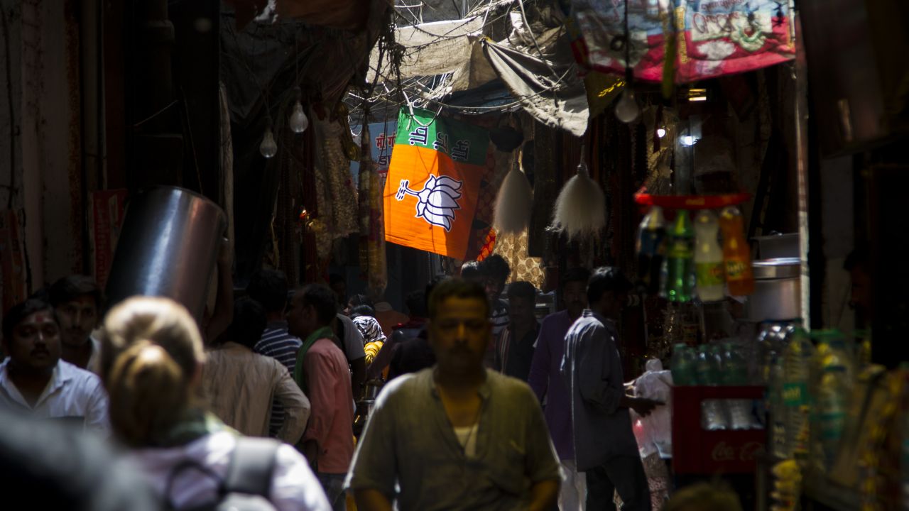 A flag of the ruling Bharatiya Janata Party (BJP) hangs over Varanasi's crowded old lanes. 