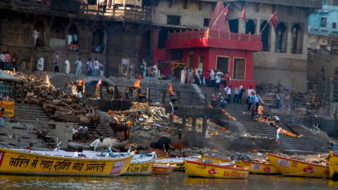 Manikarnika Ghat, one of the most sacred places in Varanasi, is where the faithful come to cremate their dead on funeral pyres, which burn 24 hours a day. 