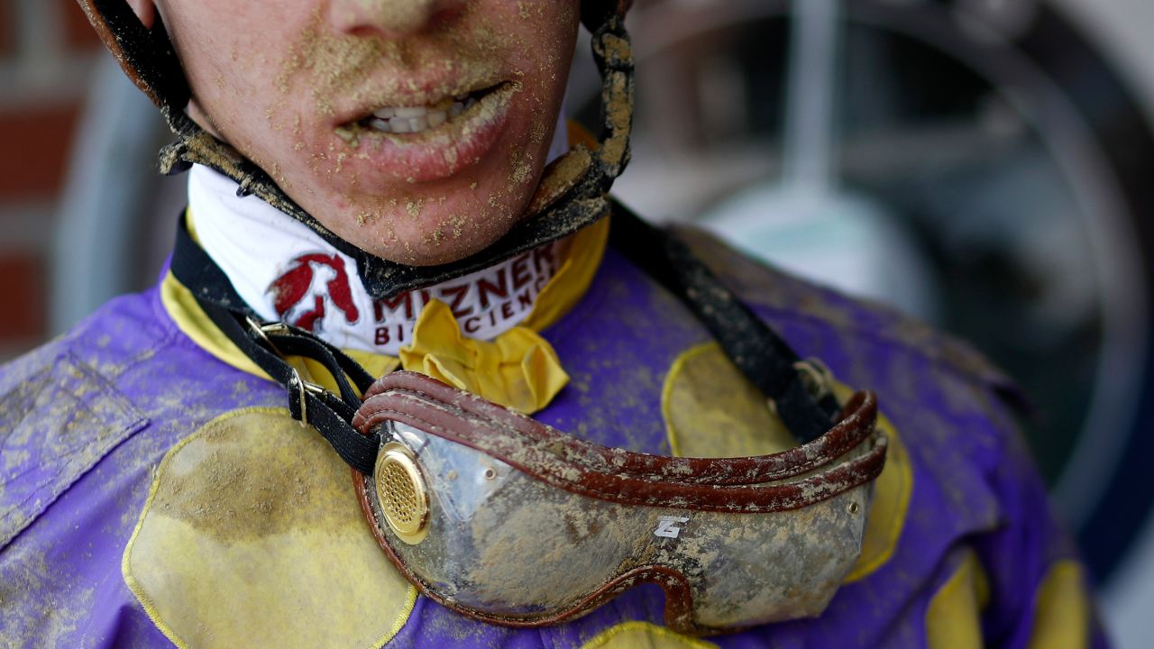 Dirt sticks to jockey Tyler Gaffalione's goggles following the day's eighth race at Pimlico Race Course, ahead of the Preakness Stakes in Baltimore.