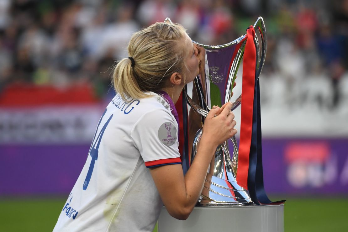 Hegerberg kisses the UEFA Women's Champions League trophy after Lyon beat Barcelona in Budapest on May 18, 2019.