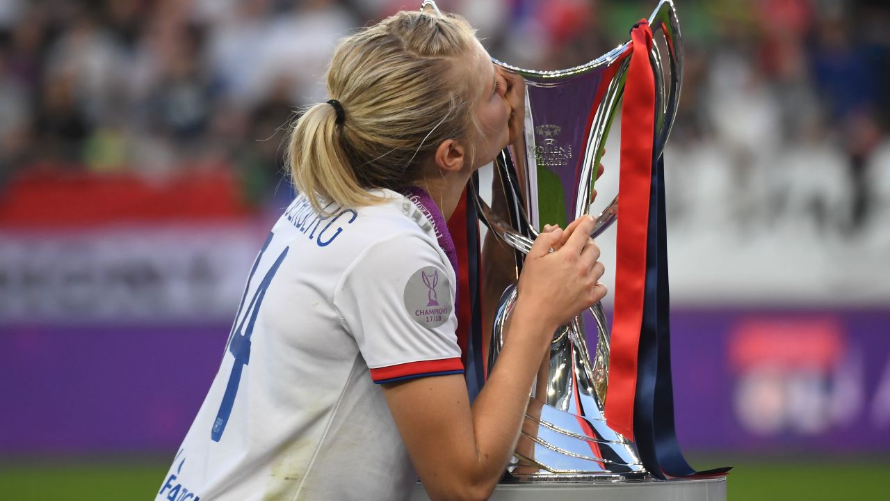Hegerberg kisses the UEFA Women's Champions League trophy after Lyon beat Barcelona in Budapest on May 18, 2019.