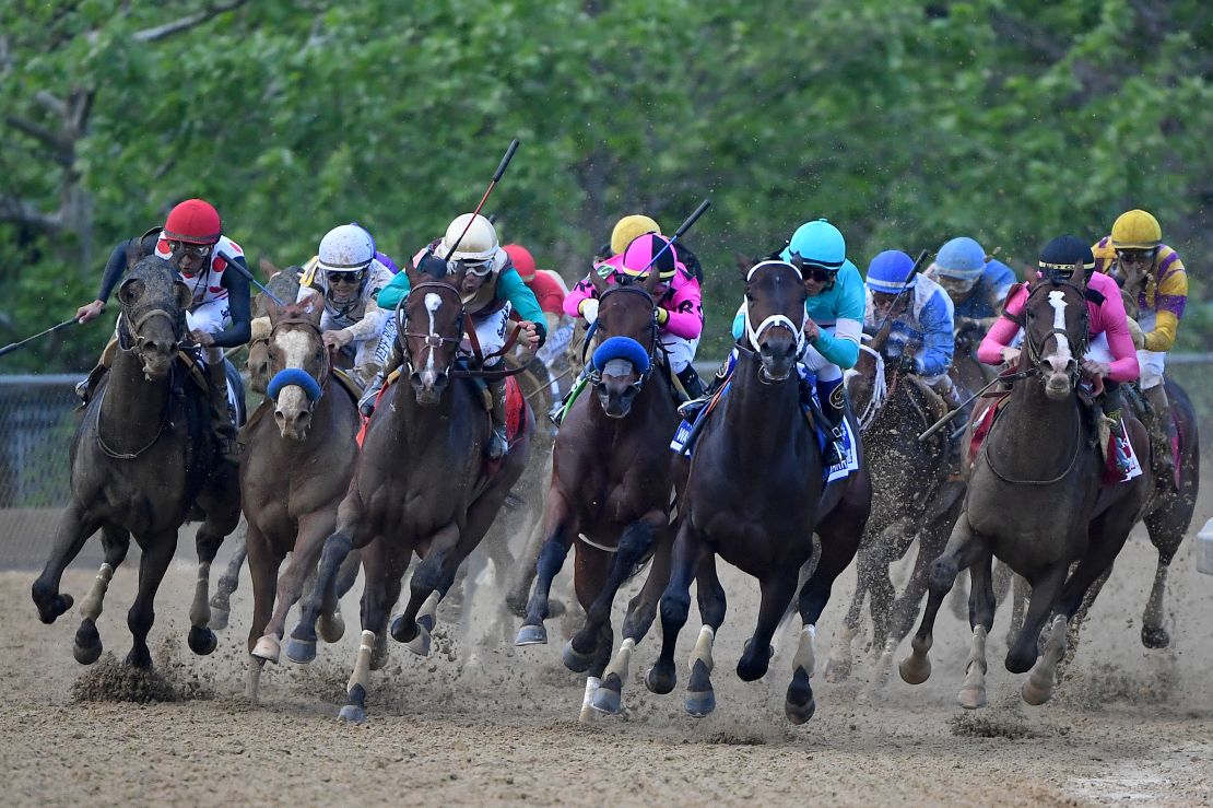 War of Will, at right, rounds the fourth turn to win the 144th running of the Preakness Stakes at Pimlico Race Course on Saturday.