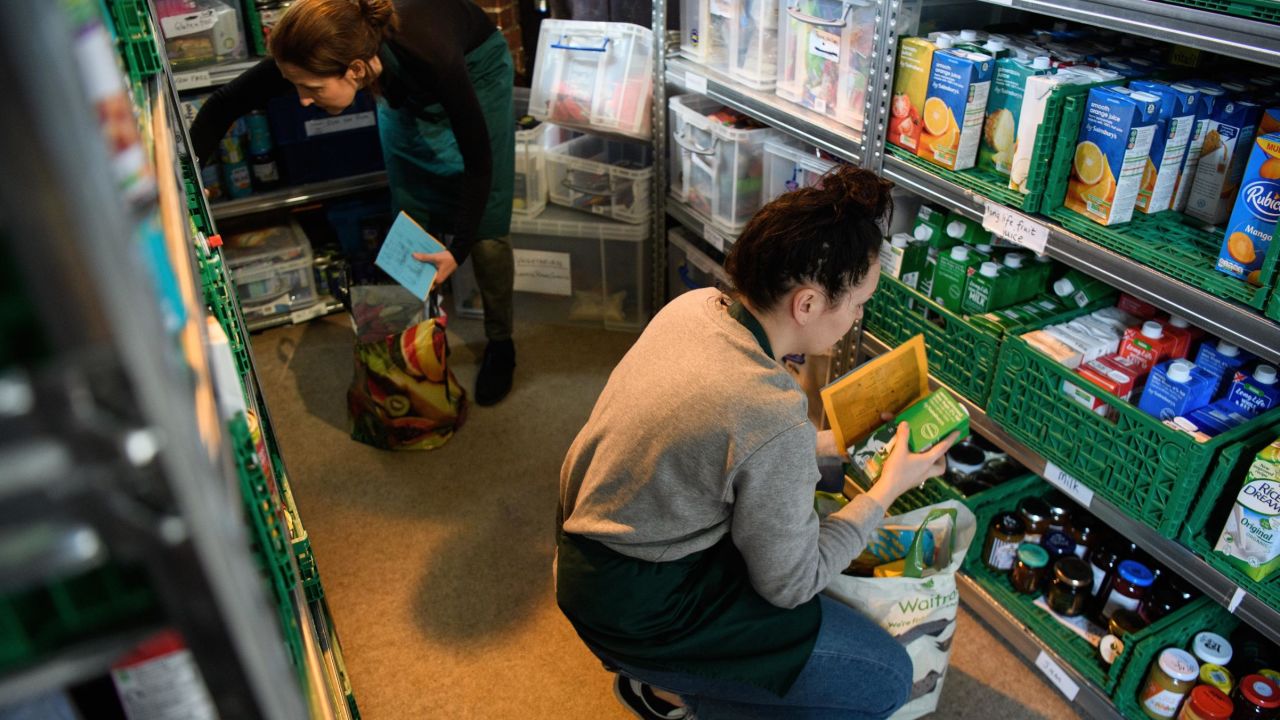 A file photograph of volunteers at London foodbank preparing food parcels in 2017.