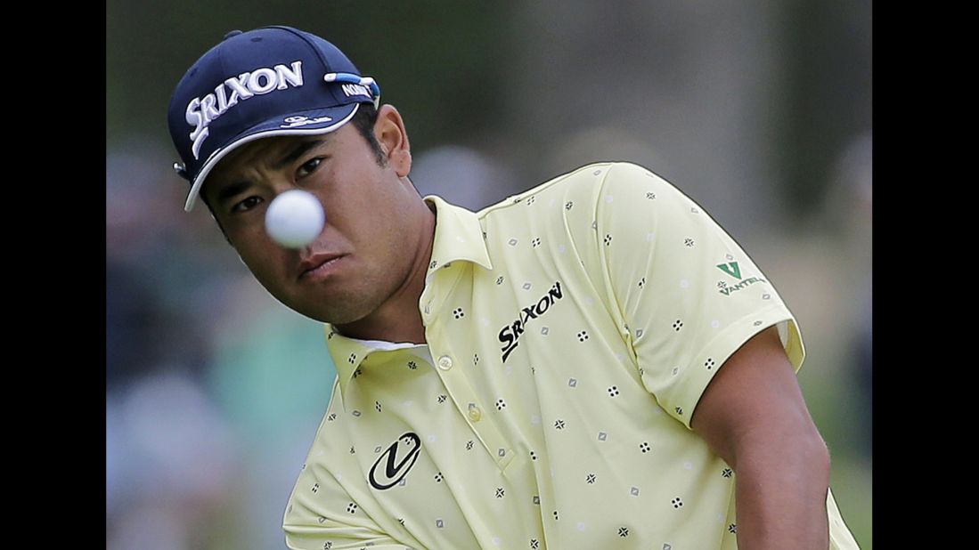 Japan's Hideki Matsuyama of Japan chips onto the 13th green during the final round of the PGA Championship.